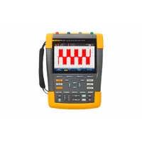 Handheld motor drive analyzer with LCD display, USB interface, and auto triggering mode. Provides True RMS AC voltage measurement with 10 mV resolution and zoom capability for detailed waveform analysis. Rated CAT IV 600V for safe use in industrial environments. Powered by included AC adapter
