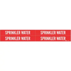 Red adhesive vinyl pipe markers with white 'Sprinkler Water' legend, designed for identifying sprinkler water lines in commercial and industrial piping systems. Each marker fits pipe outer diameters from 3/4 to 2 3/8 inches. Pack includes 4 markers without directional arrows.