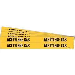 This adhesive pipe marker is used to identify acetylene gas lines in industrial piping systems. The marker features a yellow background with black legend text reading 'Acetylene Gas' and fits pipe outer diameters from 3/4 to 2-3/8 inches. Each pack contains 4 markers without arrows, sold in a 5-pack quantity.